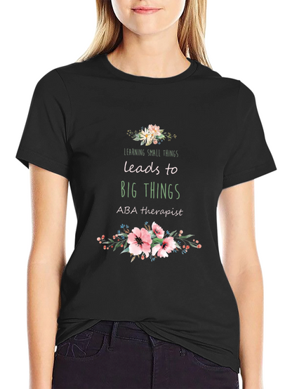 Camiseta Negra Aprender Pequeñas Cosas Lleva a Grandes Cosas