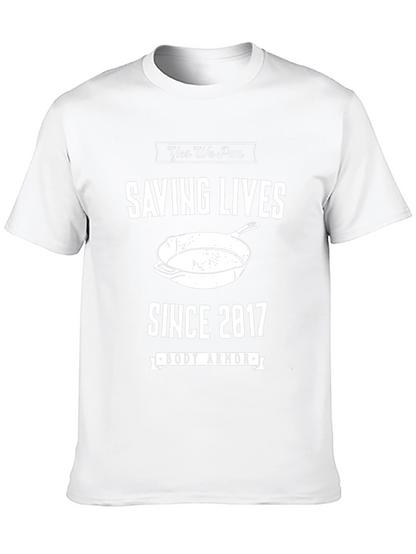 Camiseta Negra: Salvando Vidas con Sartén desde 2017