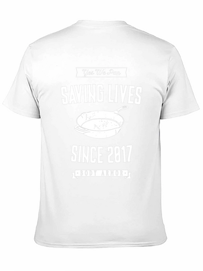 Camiseta Negra: Salvando Vidas con Sartén desde 2017